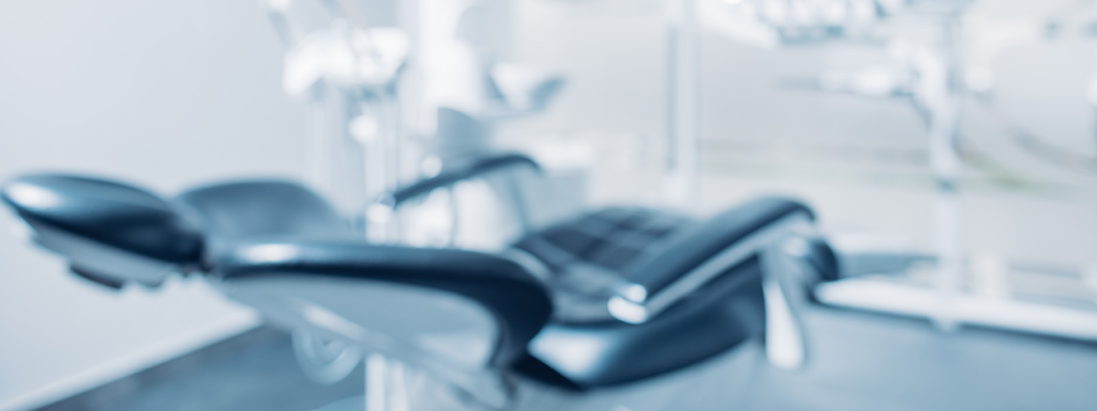 The image shows a modern interior space with sleek furniture and decor, featuring a clean and minimalist aesthetic.